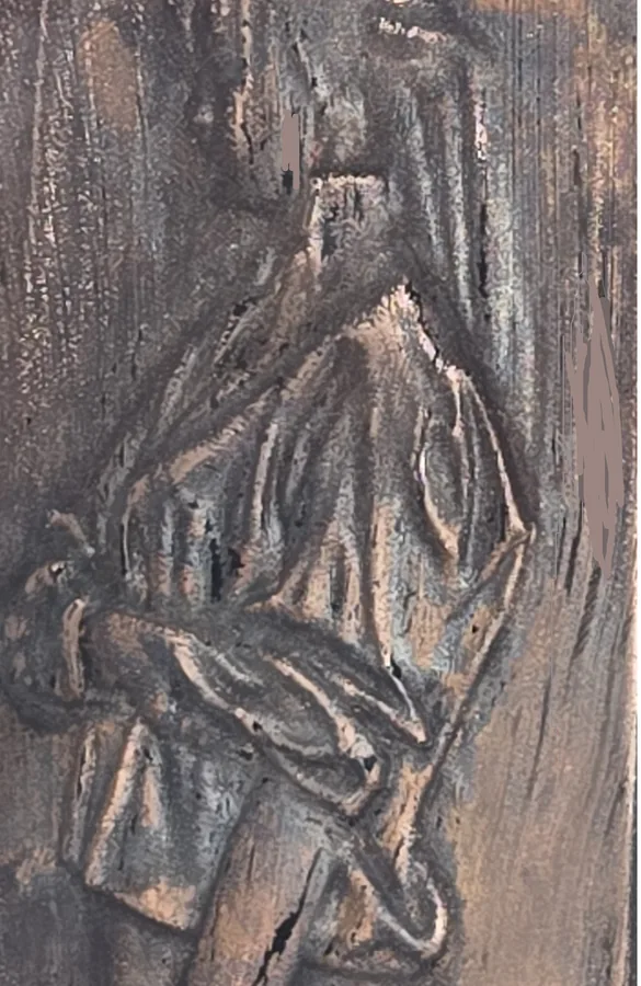 The Cathedral finish on a finished Tazbear relief of a robed figure with clasped hands